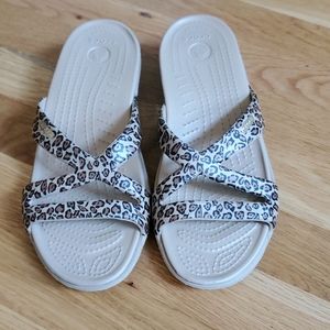 Crocs jungle print flip flops
